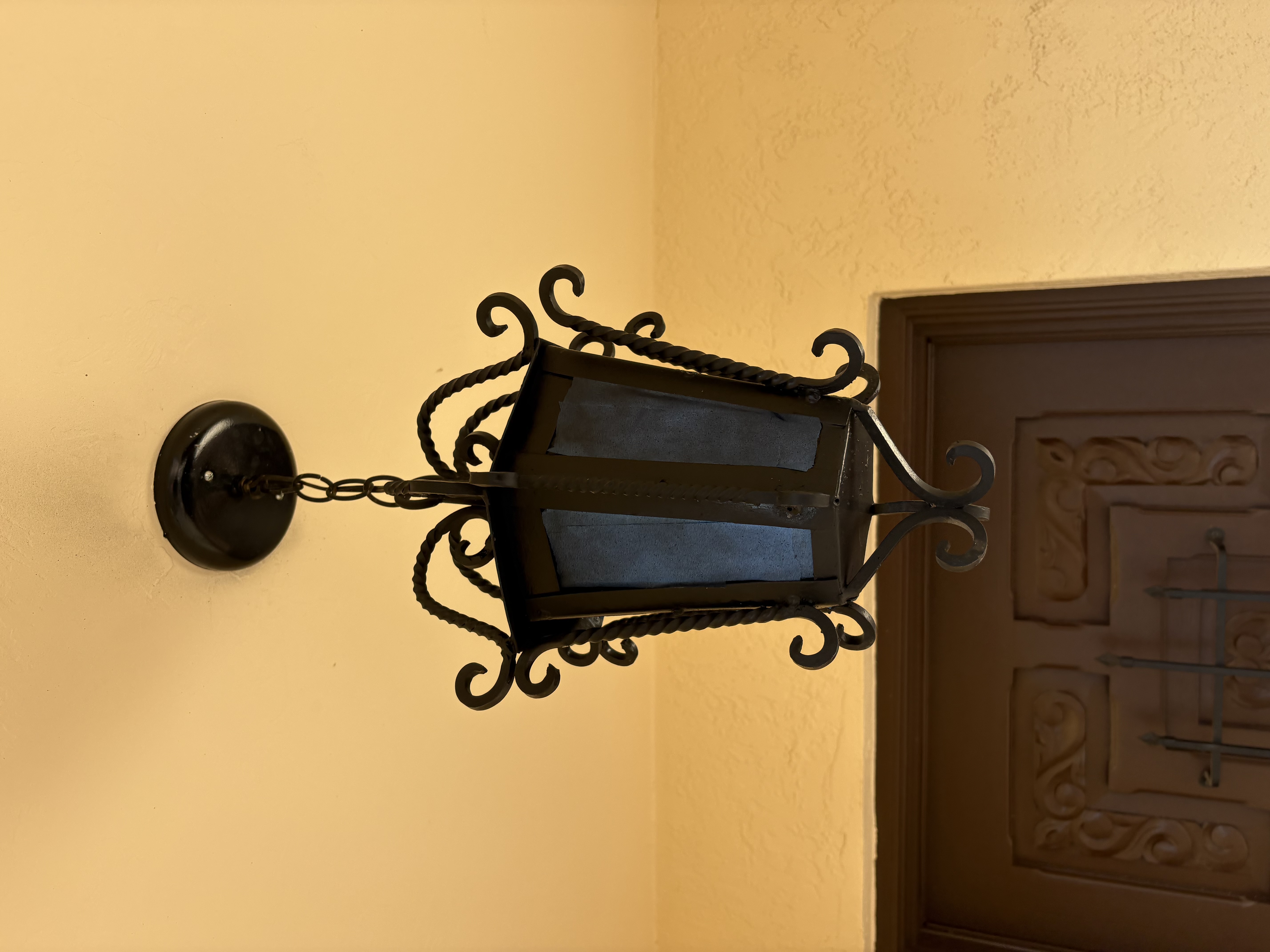 Interior wrought iron pendant lantern &mdash; entryway